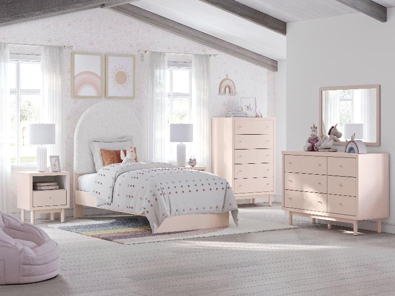 Image of Wistenpine - 8 Pc. - Dresser, Mirror, Twin Upholstered Panel Bed, 2 Nightstands - Blush