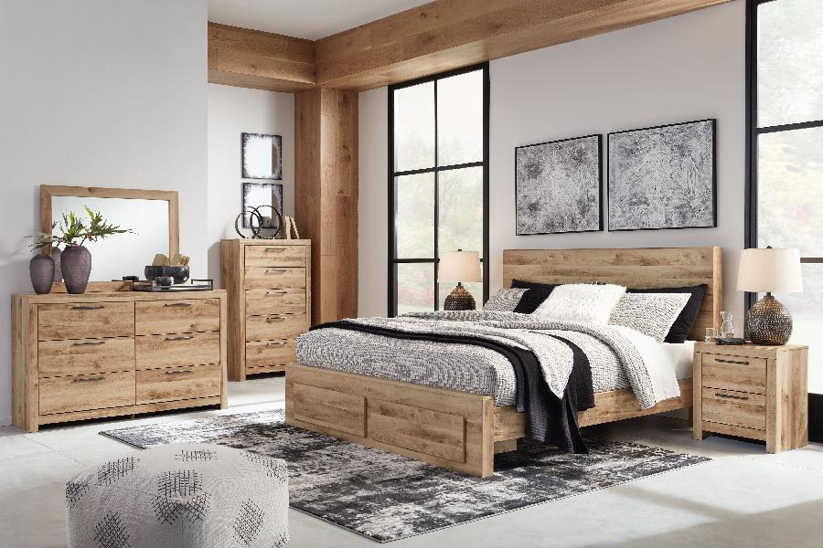 Image of Hyanna - 9 Pc. - Dresser, Mirror, Chest, King Panel Bed with Footboard Storage, 2 Nightstands - Tan