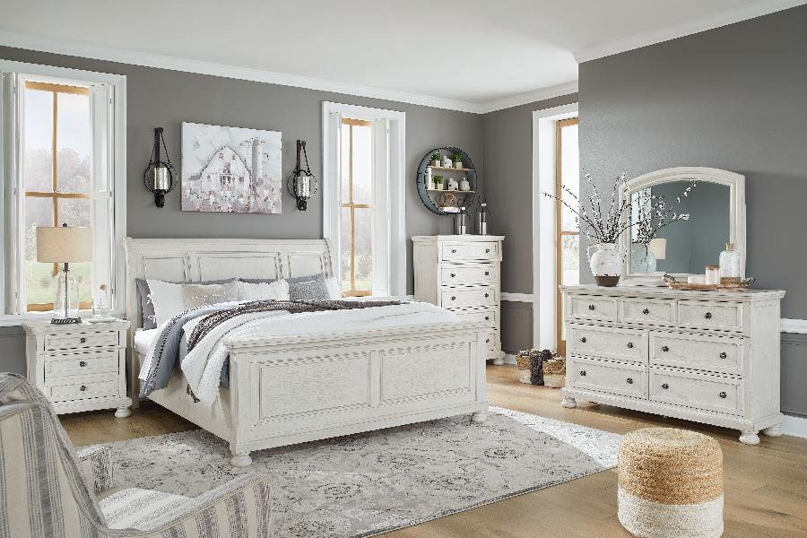 Image of Robbinsdale - 7 Pc. - Dresser, Mirror, King Sleigh Bed, 2 Nightstands - Antique White