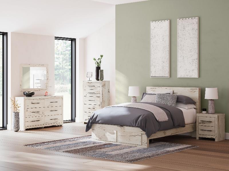 Image of Lawroy - 9 Pc. - Dresser, Mirror, Chest, Queen Panel Bed With Storage Footboard, 2 Nightstands - Light Natural