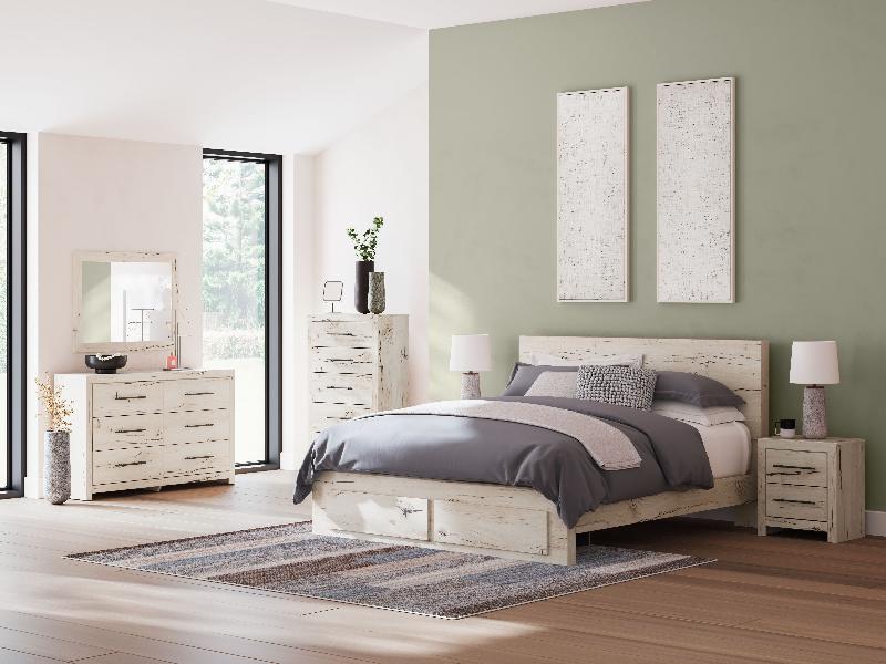 Image of Lawroy - 9 Pc. - Dresser, Mirror, Chest, King Panel Bed With Storage Footboard, 2 Nightstands - Light Natural