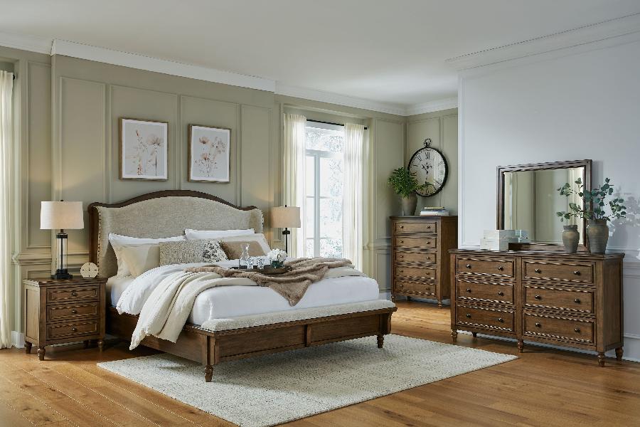 Image of Sturlayne - 8 Pc. - Dresser, Mirror, Chest, King Upholstered Panel Bed, 2 Nightstands - Brown